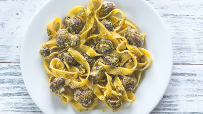Porcini mushrooms aromatic pasta with gorgonzola and walnut sauce